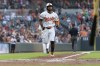 Baltimore Orioles' Cedric Mullins scores on his home run against the Texas Rangers during the fourth inning of a baseball game Thursday, June 27, 2024, in Baltimore. (AP Photo/Stephanie Scarbrough)