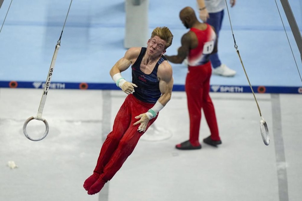 Shane Wiskus competes on the still rings at the United States Gymnastics Olympic Trials on Thursday, June 27, 2024, in Minneapolis. (AP Photo/Charlie Riedel)