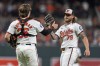 Baltimore Orioles catcher Adley Rutschman (35) and relief pitcher Nick Vespi (79) celebrate the team's win against the Texas Rangers in a baseball game Thursday, June 27, 2024, in Baltimore. (AP Photo/Stephanie Scarbrough)