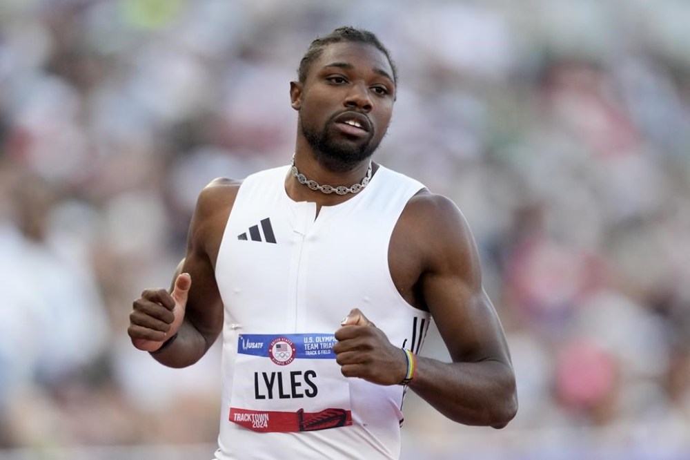Noah Lyles wins a heat in the men's 200-meter run during the U.S. Track and Field Olympic Team Trials Thursday, June 27, 2024, in Eugene, Ore. (AP Photo/Charlie Neibergall)