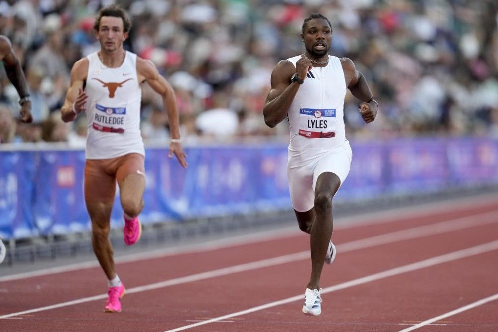 Noah Lyles wins a heat in the men's 200-meter run during the U.S. Track and Field Olympic Team Trials Thursday, June 27, 2024, in Eugene, Ore. (AP Photo/Charlie Neibergall)
