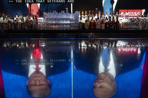 Liquor bottles are placed on a back bar at the Abbey Food & Bar in West Hollywood, Calif., Thursday, June 27, 2024, as a presidential debate between President Joe Biden and Republican presidential candidate, former President Donald Trump, is broadcast. (AP Photo/Jae C. Hong)