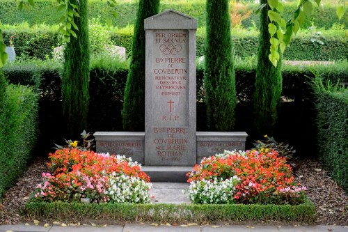 FILE - The grave of International Olympic Committee (IOC) founder baron Pierre de Coubertin is photographed at the Bois-de-Vaux cemetery, in Lausanne, Switzerland, Thursday, Sept.11, 2014. Coubertin envisioned the Olympics as a pacifist exercise that could foster international cooperation and peace, especially in the wake of France's defeat in the Franco-Prussian War. (AP Photo/Keystone,Laurent Gillieron, File)