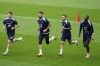 France players Benjamin Pavard, left, Olivier Giroud, second left, Jonathan Clauss, second right, and Ibrahima Konate run during a training session in Paderborn, Germany, Wednesday, June 19, 2024. France will play against Netherland during their Group D soccer match at the Euro 2024 soccer tournament on June 21. (AP Photo/Hassan Ammar)