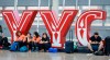 Travellers wait for flights at Calgary International Airport as WestJet mechanics strike in Calgary, Saturday, June 29, 2024. THE CANADIAN PRESS/Jeff McIntosh