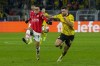 FILE -PSV's Sergino Dest, left, duels for the ball with Dortmund's Niclas Fuellkrug during the Champions League round of 16 second leg soccer match between Borussia Dortmund and PSV Eindhoven at the Signal Iduna Park in Dortmund, Germany, Wednesday, March 13, 2024. American defender Sergiño Dest will remain with PSV Eindhoven, agreeing Saturday, June 29, 2024, to a four-year contract. (AP Photo/Martin Meissner, File)