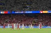 Players leave the pitch after the referee paused the match due to a thunder and lighning storm during the round of sixteen match between Germany and Denmark at the Euro 2024 soccer tournament in Dortmund, Germany, Saturday, June 29, 2024. (AP Photo/Martin Meissner)