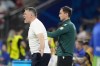 Georgia coach Willy Sagnol instructs from the sideline during a Group F match between Georgia and Portugal at the Euro 2024 soccer tournament in Gelsenkirchen, Germany, Wednesday, June 26, 2024. (AP Photo/Martin Meissner)