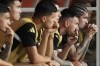 Argentina's Lionel Messi, center, and Rodrigo De Paul, right, sit on the bench during a Copa America Group A soccer match against Peru in Miami Gardens, Fla., Saturday, June 29, 2024. (AP Photo/Lynne Sladky)