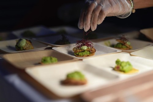 Olga Leon garnishes tostadas made with 