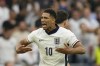 England's Jude Bellingham celebrates after scoring his side's opening goal during a round of sixteen match between England and Slovakia at the Euro 2024 soccer tournament in Gelsenkirchen, Germany, Sunday, June 30, 2024. (AP Photo/Antonio Calanni)