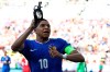 Kylian Mbappe of France celebrates after scoring a penalty kick during a Group D match between the France and Poland at the Euro 2024 soccer tournament in Dortmund, Germany, Tuesday, June 25, 2024. (Friso Gentsch/dpa via AP)