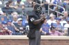 Umpire James Jean stands behind home plate during the fourth inning of a baseball game between the New York Mets and the Houston Astros, Sunday, June 30, 2024, in New York. (AP Photo/Pamela Smith)