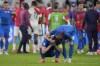 Slovakia players react disappointed after a round of sixteen match between England and Slovakia at the Euro 2024 soccer tournament in Gelsenkirchen, Germany, Sunday, June 30, 2024. (AP Photo/Ariel Schalit)