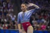 Suni Lee competes in the floor exercise at the United States Gymnastics Olympic Trials on Sunday, June 30, 2024, in Minneapolis. (AP Photo/Charlie Riedel)
