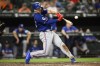 Texas Rangers' Wyatt Langford hits a three-run home run during the eighth inning of a baseball game against the Baltimore Orioles, Sunday, June 30, 2024, in Baltimore. The three-run home run completed the cycle for Langford. The Rangers won 11-2. (AP Photo/Nick Wass)
