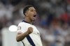 England's Jude Bellingham celebrates at the end of the round of sixteen match between England and Slovakia at the Euro 2024 soccer tournament in Gelsenkirchen, Germany, Sunday, June 30, 2024. (AP Photo/Antonio Calanni)