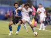 CF Montreal midfielder Mathieu Choiniere (left) and D.C. United defender Aaron Herrera battle for the ball during first half MLS soccer action in Montreal, Wednesday, May 29, 2024. Choiniere, Toronto FC's Federico Bernardeschi, Vancouver's Ryan Gauld are joining Inter Miami's Lionel Messi, Luis Suarez, Jordi Alba and Sergio Busquets at the MLS all-star game later this month.THE CANADIAN PRESS/Christinne Muschi