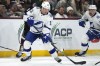 Tampa Bay Lightning forward Alex Barré-Boulet (12) skates with the puck against the Arizona Coyotes during NHL action, Tuesday, Nov. 28, 2023, in Tempe, Ariz. The Montreal Canadiens have signed Barré-Boulet to a one-year, one-way contract.THE CANADIAN PRESS/AP/Ross D. Franklin