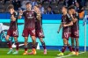 FILE - Nuremberg's Can Uzun, centre left, celebrates scoring a goal, during the Bundesliga second division soccer match between Hertha Berlin and Nuremberg, in Berlin, on March 30, 2024. Eintracht Frankfurt has signed the 18-year-old Turkey forward Can Uzun on a five-year contract for one of the most promising young players in German soccer. Uzun, who was born and raised in Germany, scored 19 goals in 32 games for second-division Nuremberg last season. Frankfurt said he turned down other offers. (Andreas Gora/dpa via AP)