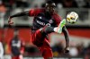 Toronto FC's Prince Owusu controls the ball against the New England Revolution during second half MLS soccer action in Toronto on Saturday, April 20, 2024. Toronto FC, mired in a four-game losing streak and seven-game winless run (0-5-2), look to turn the tide when Orlando City visits Wednesday. Orlando has its own problems, having won just one of its last seven outings (1-4-2). THE CANADIAN PRESS/Frank Gunn