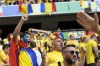 Romania fans cheer before a round of sixteen match between Romania and the Netherlands at the Euro 2024 soccer tournament in Munich, Germany, Tuesday, July 2, 2024. (AP Photo/Ariel Schalit)