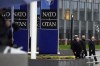 FILE - NATO Secretary General Jens Stoltenberg, second right, arrives for a wreath laying ceremony at NATO headquarters in Brussels, April 4, 2024. A survey of people in 13 of the nations belonging to NATO found about 6 in 10 of them held a favorable view of the Western military alliance, the Pew Research Center said Tuesday, July 2. (AP Photo/Virginia Mayo, File)