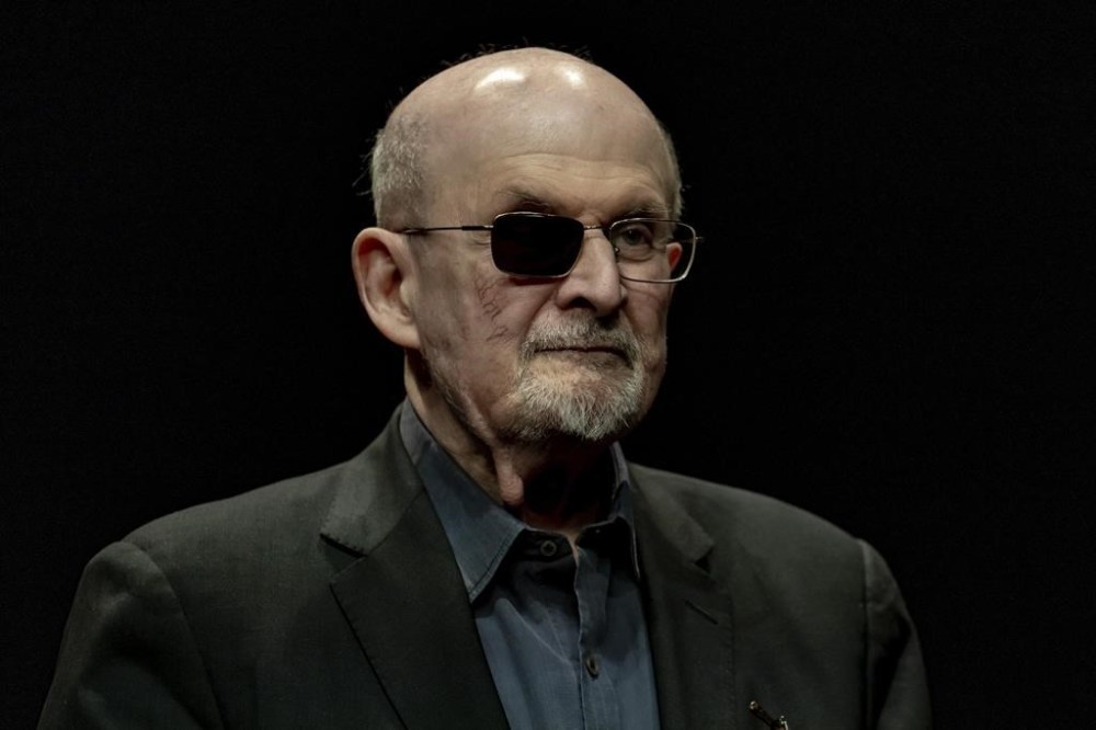 FILE - Salman Rushdie poses for a portrait to promote his book