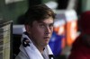 Philadelphia Phillies starting pitcher Michael Mercado looks out from the dugout during the third inning of a baseball game against the Chicago Cubs Tuesday, July 2, 2024, in Chicago. (AP Photo/Charles Rex Arbogast)
