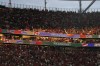 FILE - Supporters of Portugal wait for the start of a round of sixteen match between Portugal and Slovenia at the Euro 2024 soccer tournament in Frankfurt, Germany, Monday, July 1, 2024. Police in the German city of Frankfurt are investigating a video that appears to show a fan being punched and kicked while being detained by a group of Euro 2024 security personnel. (AP Photo/Matthias Schrader, File)