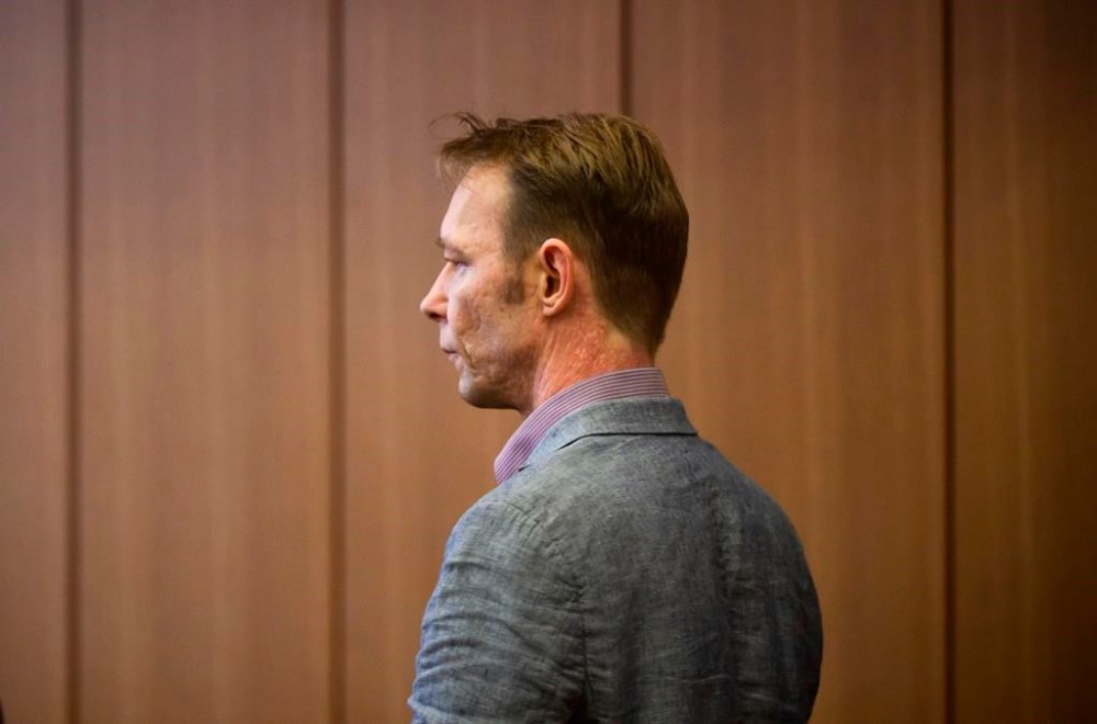 FILE - Christian B. arrives at the start of his trial, at Braunschweig district court, in Brunswick, Germany, on Feb. 16, 2024. An arrest warrant against a man who is also a suspect in the disappearance of British toddler Madeleine McCann has been lifted by a German court in an ongoing trial over several unrelated sexual offenses he is alleged to have committed in Portugal between 2000 and 2017. However, the 47-year-old German, who has been identified by media as Christian Bruckner, will remain jailed because he is currently serving a seven-year prison sentence in Germany for a rape he committed in Portugal in 2005. (Julian Stratenschulte/dpa via AP)