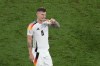 Germany's Toni Kroos applauds fans at the end of the round of sixteen match between Germany and Denmark at the Euro 2024 soccer tournament in Dortmund, Germany, Saturday, June 29, 2024. (AP Photo/Hassan Ammar)