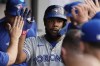 Toronto Blue Jays' Vladimir Guerrero Jr. is congratulated in the dugout for a home run against the Cleveland Guardians during the third inning of a baseball game Friday, June 21, 2024, in Cleveland. Toronto Blue Jays first baseman Vladimir Guerrero Jr. has been named a starter for the upcoming All-Star Game. THE CANADIAN PRESS/AP, Sue Ogrocki