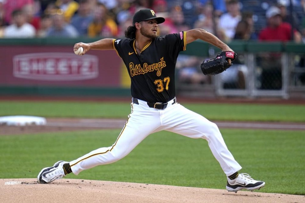 Pittsburgh Pirates starting pitcher Jared Jones delivers during the first inning of a baseball game against the St. Louis Cardinals in Pittsburgh, Wednesday, July 3, 2024. (AP Photo/Gene J. Puskar)