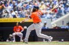 Houston Astros first base Jon Singleton (28) hits a line drive n single during first inning MLB action against the Toronto Blue Jays in Toronto on Thursday, July 4, 2024. THE CANADIAN PRESS/Christopher Katsarov
