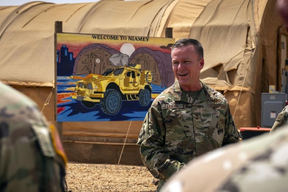 In this image by the U.S. Air Force, Maj. Gen. Kenneth P. Ekman speaks in front of a