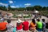 Manitobans are increasingly worried about the cost of living and crime, and are becoming less confident in the justice system and public service, a poll commissioned by the provincial government suggests. A crowd watches the powwow at Oodena Circle during the A New Day celebrations at the Forks in Winnipeg, Friday, July 1, 2022. THE CANADIAN PRESS/Daniel Crump
