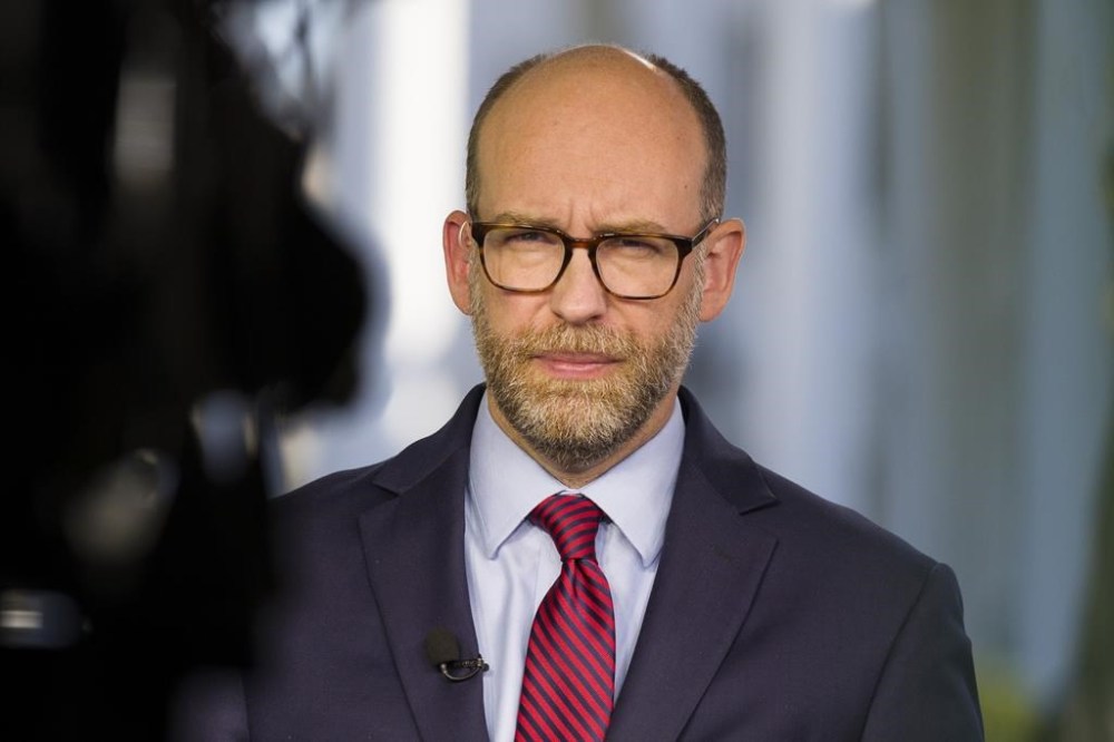 FILE - Acting director of Office of Management and Budget Russ Vought listens during a television interview at the White House, Oct. 21, 2019, in Washington. Former President Donald Trump is seeking to distance himself from a plan for a massive overhaul of the federal government drafted by some of his administration officials, including Vought. Some of these men are expected to take high-level roles if the Republican presumptive nominee is elected back into the White House. Trump is saying on Truth Social that he