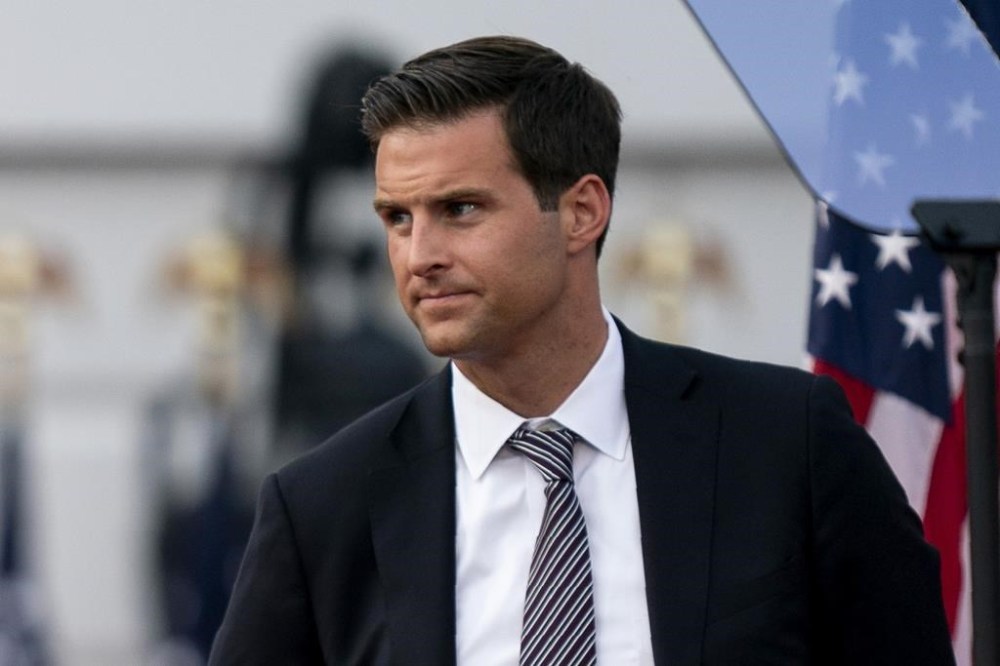 FILE - Director of the Presidential Personnel Office John McEntee is seen on the South Lawn of the White House, Aug. 27, 2020, in Washington. Former President Donald Trump is seeking to distance himself from a plan for a massive overhaul of the federal government drafted by some of his administration officials, including McEntee. Some of these men are expected to take high-level roles if the Republican presumptive nominee is elected back into the White House. Trump is saying on Truth Social that he