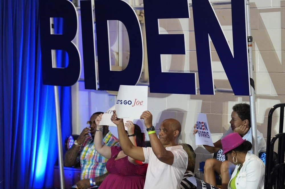 Supporters arrive before President Joe Biden speaks at a campaign event at Sherman Middle School in Madison, Wis., Friday, July 5, 2024. (AP Photo/Morry Gash)