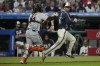 Cleveland Guardians' David Fry (6) is tagged out by San Francisco Giants catcher Patrick Bailey (14) in the sixth inning of a baseball game Friday, July 5, 2024, in Cleveland. (AP Photo/Sue Ogrocki)