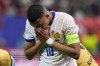 Kylian Mbappe of France reacts after an injury during a quarter final match between Portugal and France at the Euro 2024 soccer tournament in Hamburg, Germany, Friday, July 5, 2024. (AP Photo/Frank Augstein)