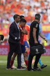 Spain's Pedri leave the pitch after being injured during a quarter final match between Germany and Spain at the Euro 2024 soccer tournament in Stuttgart, Germany, Friday, July 5, 2024. (AP Photo/Matthias Schrader)