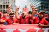 Turkey fans show the 'wolf salute', the origin of which is attributed to a right-wing extremist movement, during a fan walk before the start of the Euro 2024 quarterfinal soccer match between Netherlands and Turkey in Berlin, Saturday, July 6, 2024. (Christoph Soeder/dpa via AP)