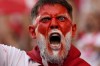 A fan cheers before a quarterfinal match between the Netherlands and Turkey at the Euro 2024 soccer tournament in Berlin, Germany, Saturday, July 6, 2024. (AP Photo/Ariel Schalit)