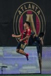 Atlanta United midfielder Thiago Almada celebrates after a goal during the first half of an MLS soccer match against Toronto FC, Saturday, June 29, 2024, in Atlanta. (AP Photo/Danny Karnik)
