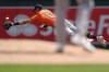 Houston Astros second baseman Mauricio Dubón (14) dives for a single hit by Minnesota Twins' Willi Castro during the first inning of a baseball game Saturday, July 6, 2024, in Minneapolis. (AP Photo/Abbie Parr)