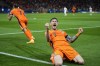 Wout Weghorst of the Netherlands, celebrates after an own goal by Turkey's Mert Muldur during a quarterfinal match between the Netherlands and Turkey at the Euro 2024 soccer tournament in Berlin, Germany, Saturday, July 6, 2024. (AP Photo/Ebrahim Noroozi)