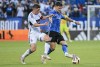 Vancouver Whitecaps' Ryan Gauld, left, challenges CF Montreal's Joaquin Sosa (3) during first half MLS soccer action in Montreal, Saturday, July 6, 2024. THE CANADIAN PRESS/Graham Hughes