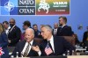 FILE - NATO Secretary General Jens Stoltenberg, right, speaks with President Joe Biden during a NATO summit in Vilnius, Lithuania, July 12, 2023. NATO allies are gathering in Washington for a summit this week, and the prospect that former President Donald Trump, the military alliance's most prominent critic, may return to power is dominating discussions. Biden's shaky performance in the presidential debate last month escalated doubts about his reelection. It's given rise to the term 